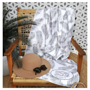 coastal luxe sand free towel over chair