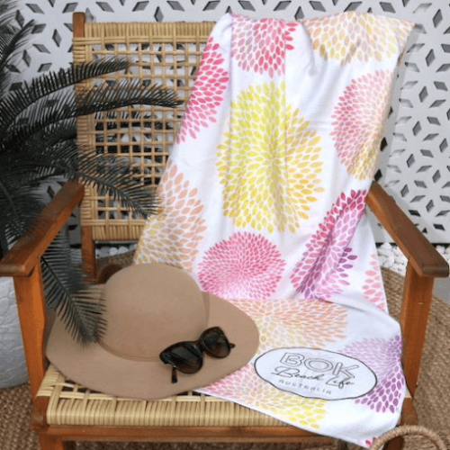 Front view of sand free bok coral daze beach towel